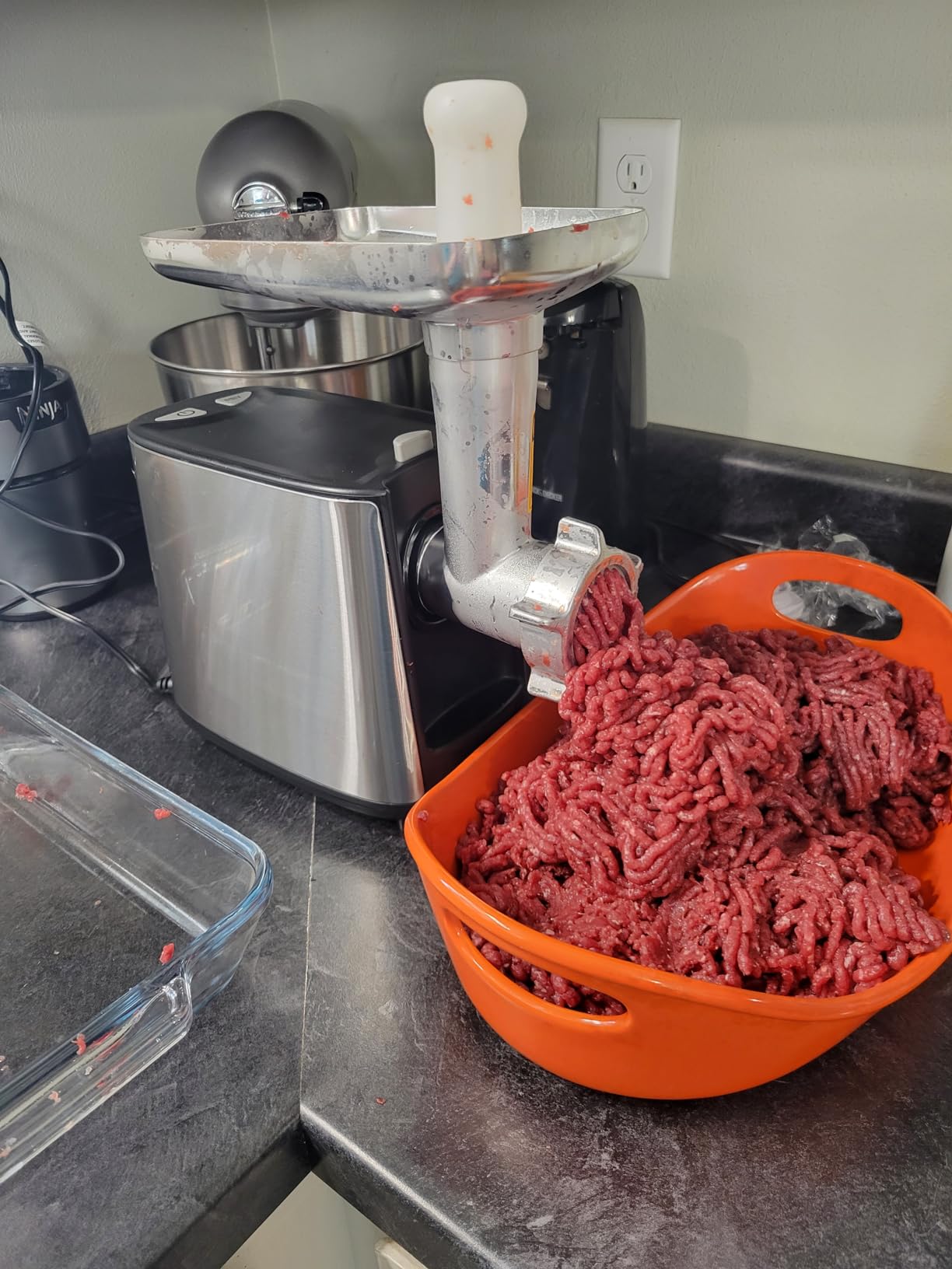 Bulk Costco chuck roll being ground into burger meat with the Yabano grinder